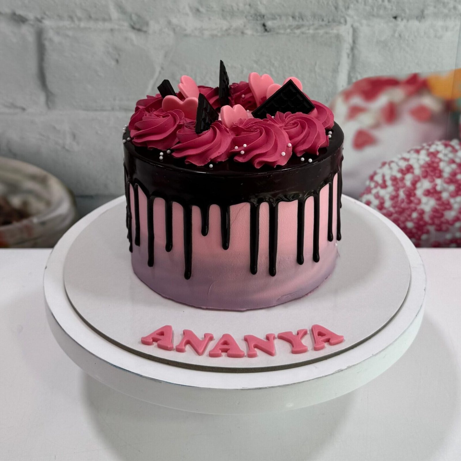 Midnight Rosette Drip cake